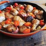 chicken with shallots in skillet, flat shot